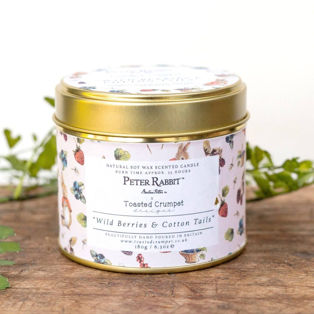 Flopsy "Wild Berries&Cotton Tails" Candle in a Matt Gold Tin - Magnolia the Florist Delight your senses with the Flopsy "Wild Berries & Cotton Tails" Candle from Toasted Crumpet. Encased in a luxurious matt gold tin, this candle fills your space with a warm, inviting glow and a captivating aroma. With Toasted Crumpet, you're not just getting a candle, you're bringing the beauty of the outdoors into your home. Enjoy the charm of British nature, encapsulated in our candle.  1