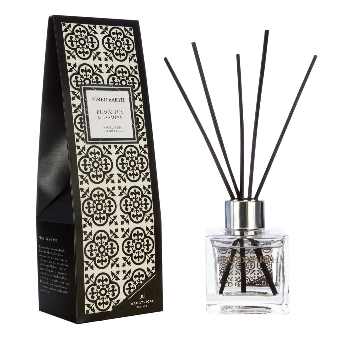 Fired Earth Reed Diffuser 100ml, Black Tea & Jasmine - Magnolia the Florist Immerse yourself in an alluring fragrance with this Black Tea and Jasmine 100ml Reed Diffuser from Wax Lyrical’s Fired Earth collection. Featuring a glass bottle decorated with a monochrome tile design, this long-lasting diffuser fills your space with a rich oriental blend.  1