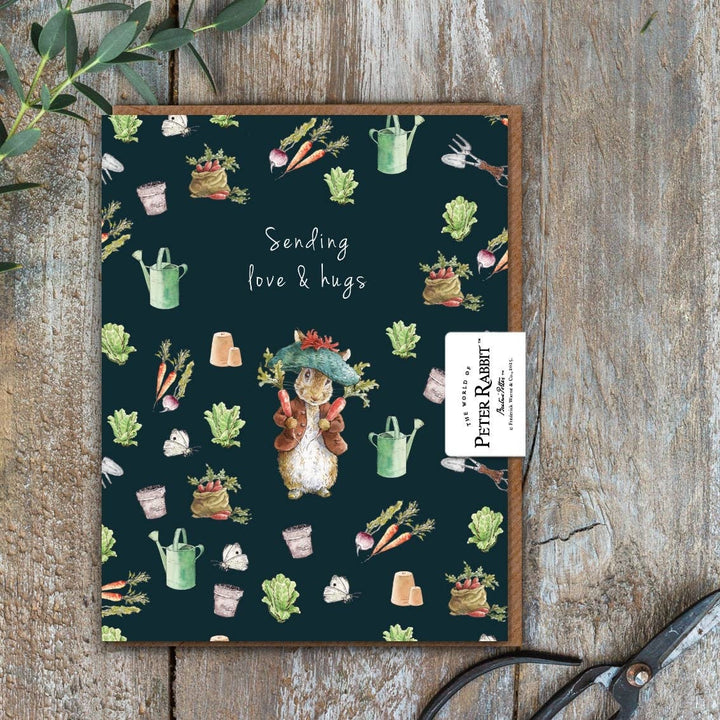 Sending Love &amp; Hugs (Benjamin Bunny) Card - Magnolia the Florist A sweet Benjamin Bunny mini card to send love and hugs — finished with luxe gold‑foiled debossing and printed on beautifully textured, fully recyclable card. A thoughtful little add‑on for your flowers. Size is 108 × 120 mm • Blank inside • Includes white envelope  2