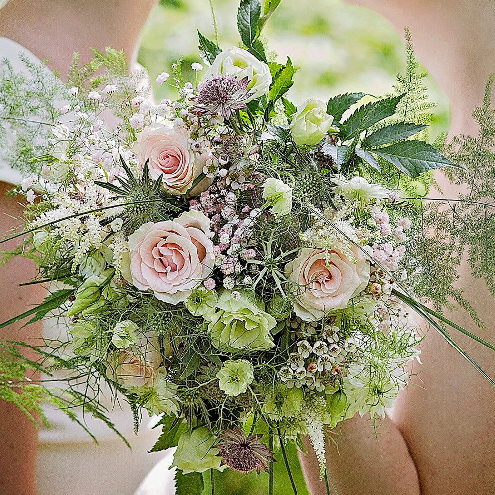 Bridal Bouquet - Magnolia the Florist An abundant bridal bouquet featuring the best blooms the season has to offer. Select your colour palette and we’ll craft a stunning design just for you! Please note this item requires a minimum 1-day notice to order.  1