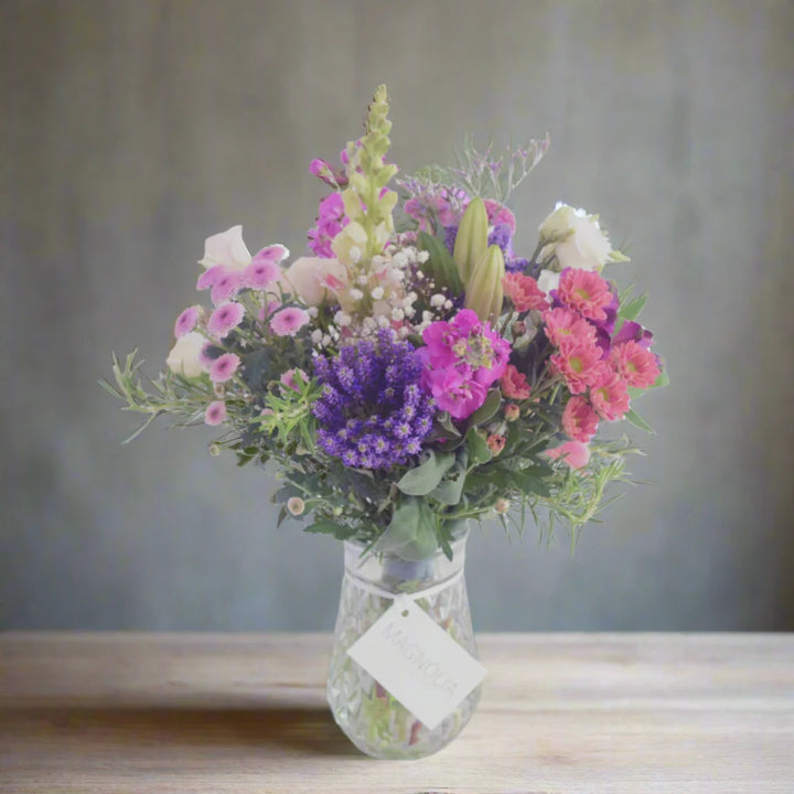 Vase - Magnolia the Florist Vase arrangement is available in mixed Blooms to match the bridal Flowers.  1