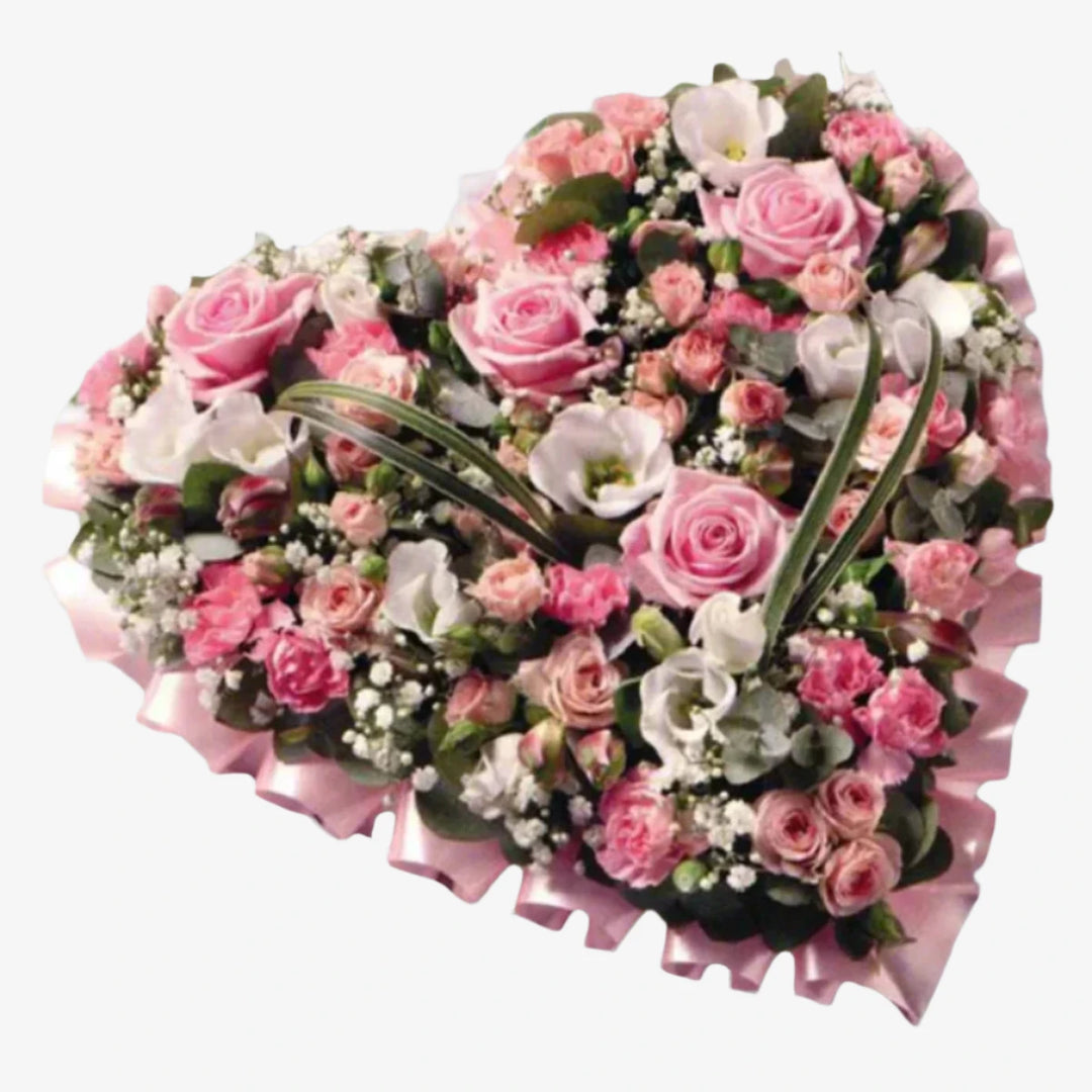Pink & White Heart - Magnolia the Florist A 15" heart-shaped design in pink shades including large-headed Roses, Spray Roses, Lisianthus, Spray Carnations, Alstroemeria and Gypsophila. If you cannot find what you want on our site, please call our sales team, we're always happy to assist you This item requires 3 days notice to order.  1