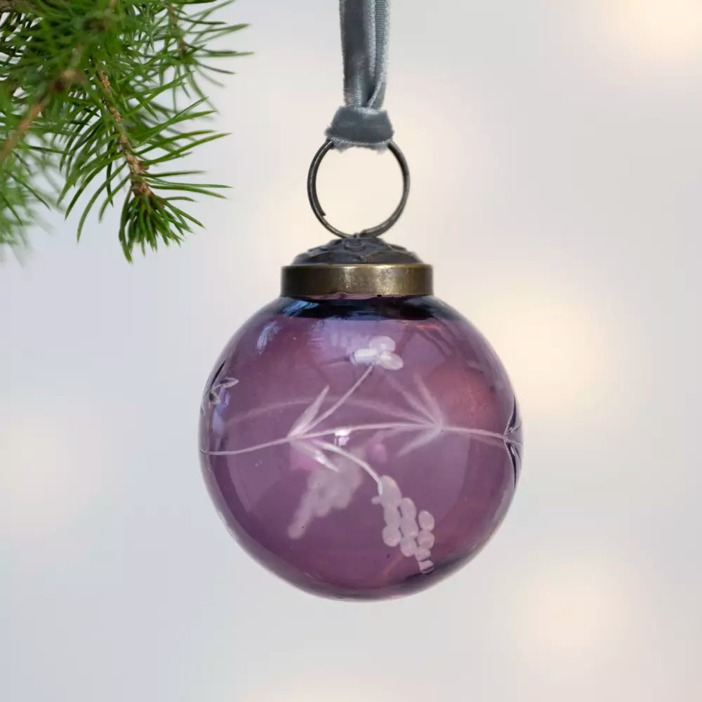 Etched Round Decoration  - Purple - 5cm - Magnolia the Florist Instantly make your Christmas tree more fun with this stylish purple glass bauble. With detailed hand etching that catches the light beautifully, this 5cm decoration packs a larger than expected punch and adds subtle elegance to your festive display. This charming little bauble will hang effortlessly in your tree, quietly helping to make Christmas, Christmas. Dimensions: 5 cm - Glass  2