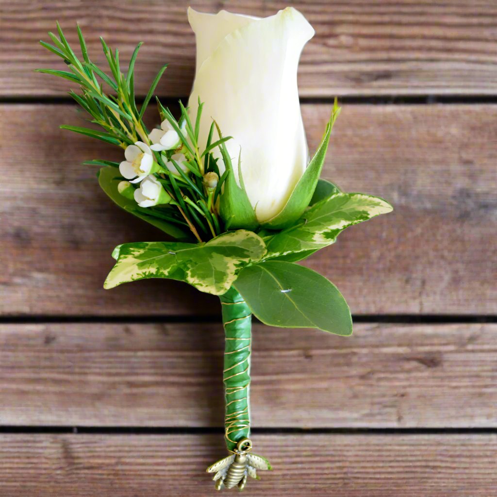 Button Hole - Magnolia the Florist Beautiful floral accents to adorn a suit or lapel. Each single Button hole comes with an easy-pin attachment.  1