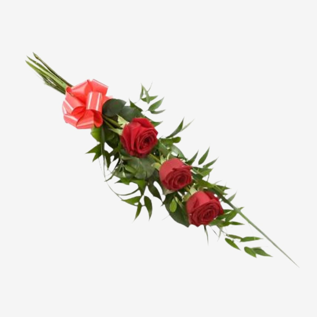 3 Rose Sheaf - Magnolia the Florist A simple tied sheaf of 3 roses with elegant foliage. The image shows Red, although other colour options are available. Please select your colour option from below. Please note that the approximate length of hand-tied sheaves is 45cm If you cannot find what you want on our site, please call our sales team, we're always happy to assist you. This item requires 1 days notice to order. Appox lenght 45cm  1