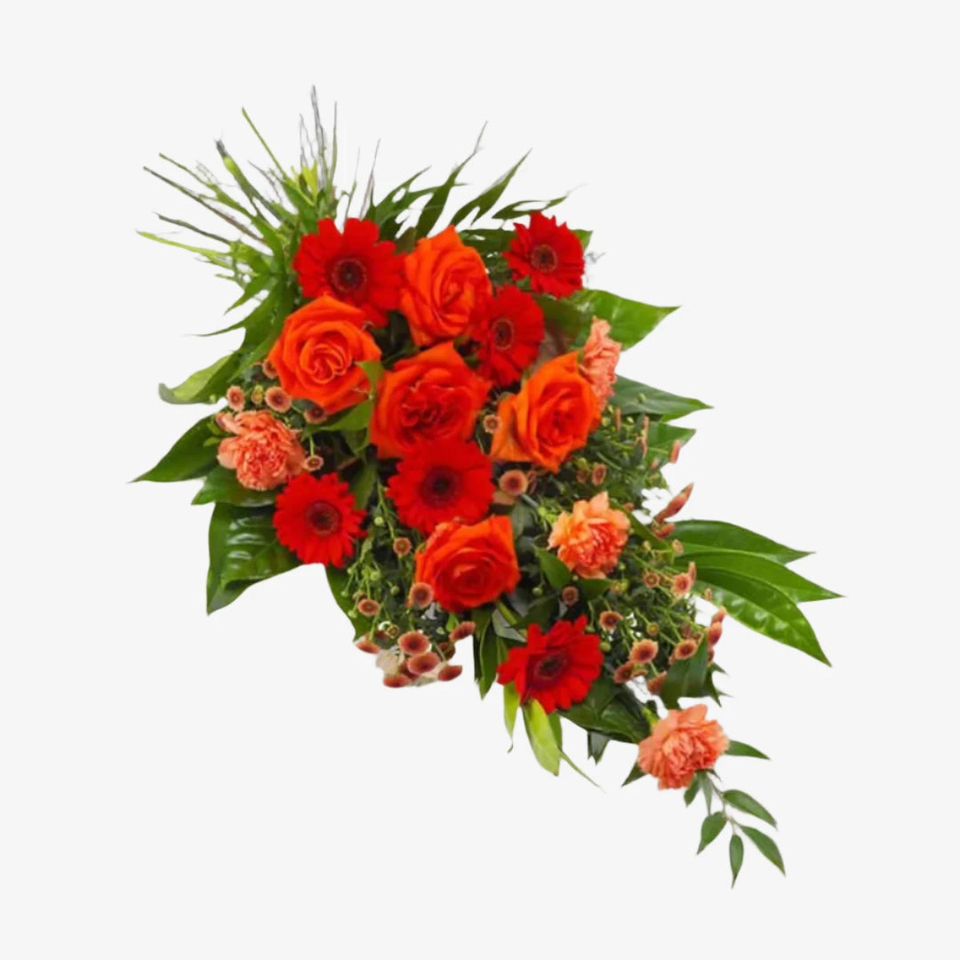 Orange & Red Hand-Tied Sheaf - Magnolia the Florist This hand-tied funeral sheaf features a vibrant mix of orange and red-toned flowers, including Roses, Carnations, mini Gerbera, and mixed foliage. Express your deepest sympathies with this beautiful arrangement. If you cannot find what you want on our site, please call our sales team, we're always happy to assist you. This item requires 2 day notice to order. Appox lenght 45cm  1