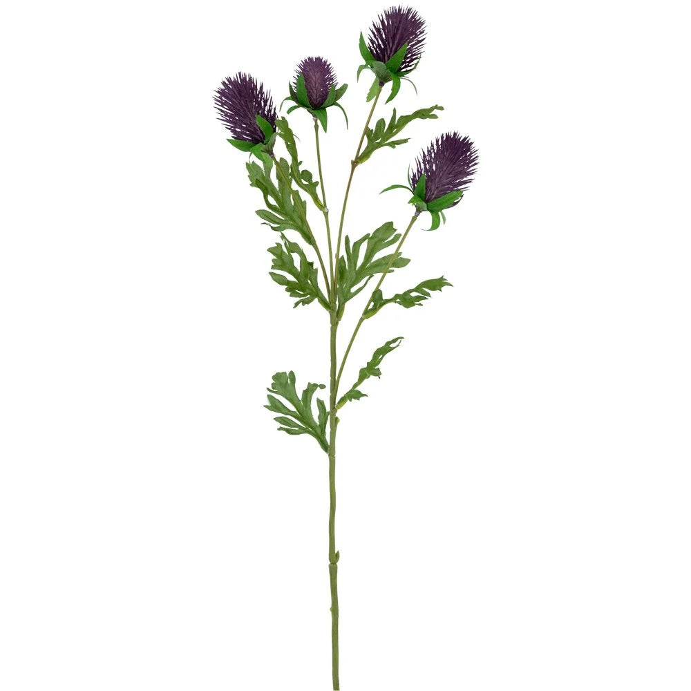 Thistle Purple 62cm - Magnolia the Florist At 62cm tall this stunning large bloom will add a big splash of Summer to any arrangement. Our large faux Ranunculus has a flocked texture green stem and delicate mid-green leaves. The white petals are finely detailed with a creamy-yellow centre.  1