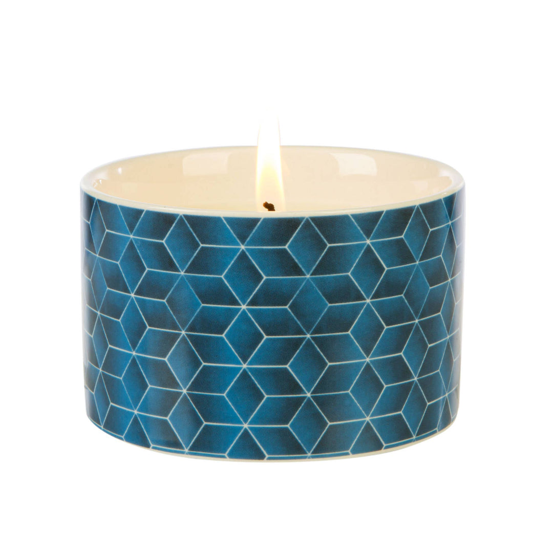 Fired Earth Candle Medium Ceramic Assam & White Cedar - Magnolia the Florist This Assam and White Cedar Medium Candle from Wax Lyrical features an abstract tile print from Fired Earth. A beautiful decorative piece for the home that boasts an enlivening blend of grapefruit, green violet, golden assam and delicate lily.  1
