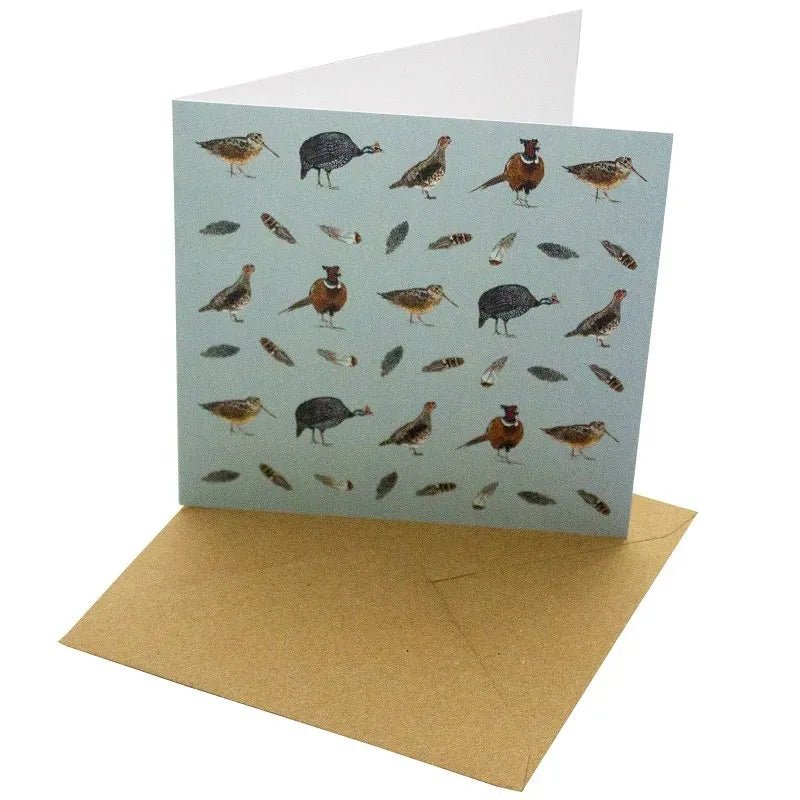 Blue Game Bird Greetings Card - Magnolia the Florist Gift your loved ones a beautiful Blue Game Bird Greetings Card that will make any occasion special. This 148mm square card is made with a sustainable, 100% recycled unbleached 350gsm paper. The featured game bird and feather design with a blank interior for a personal message makes it a perfect choice for any special day.  1