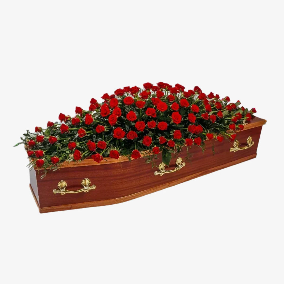 Rose Casket Spray - Magnolia the Florist Large and small-headed Roses combine with luxurious foliage to create this traditional Rose Casket Spray. The image shows Red roses, although other colours are available. Please select what colour roses you would like. If you cannot find what you want on our site, please call our sales team, we're always happy to assist you This item requires 2 days notice to order.  1