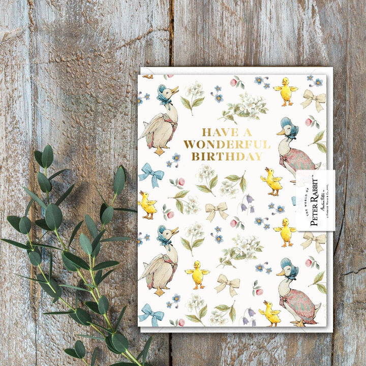 Wonderful Birthday (Jemima Puddle-Duck) Card - Magnolia the Florist A charming Jemima Puddle‑Duck mini card with a gold‑foiled birthday message — a lovely way to add a celebratory note to your flowers. Printed on beautifully textured, fully recyclable card. Size is 90 × 120 mm • Blank inside • Includes white envelope  2