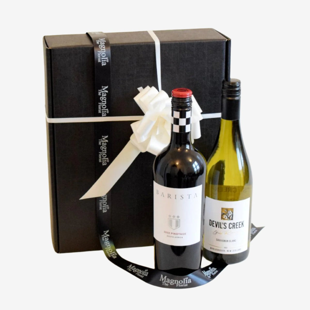 Wine Duo Gift Box - Magnolia the Florist Our fantastic gift box features two of our finest 75cl bottles of wine and is lovingly wrapped in a presentation box.Please note that this brand may be substituted for something of similar quality. We will not sell or deliver alcohol to anyone who is or appears to be, under the age of 18. By placing an order you confirm that you are at least 18 years old and we reserve the right not to deliver if we are unsure of this.  1