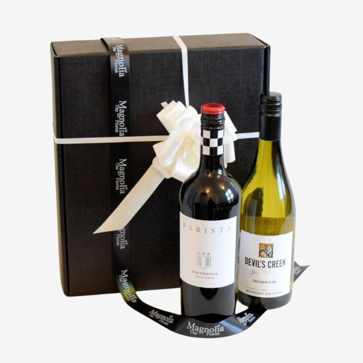 Wine Duo Gift Box - Magnolia the Florist Our fantastic gift box features two of our finest 75cl bottles of wine and is lovingly wrapped in a presentation box.Please note that this brand may be substituted for something of similar quality. We will not sell or deliver alcohol to anyone who is or appears to be, under the age of 18. By placing an order you confirm that you are at least 18 years old and we reserve the right not to deliver if we are unsure of this.  1