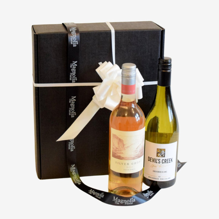 Wine Duo Gift Box - Magnolia the Florist Our fantastic gift box features two of our finest 75cl bottles of wine and is lovingly wrapped in a presentation box.Please note that this brand may be substituted for something of similar quality. We will not sell or deliver alcohol to anyone who is or appears to be, under the age of 18. By placing an order you confirm that you are at least 18 years old and we reserve the right not to deliver if we are unsure of this.  2